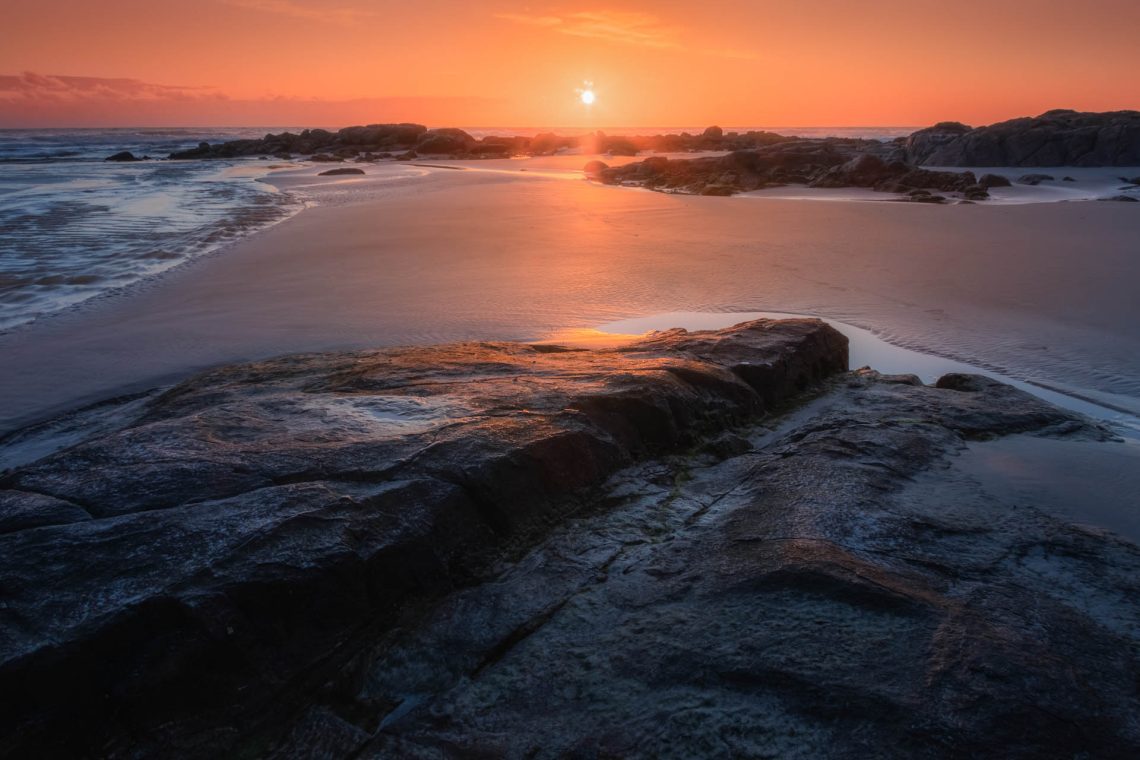 Nascer do sol na praia