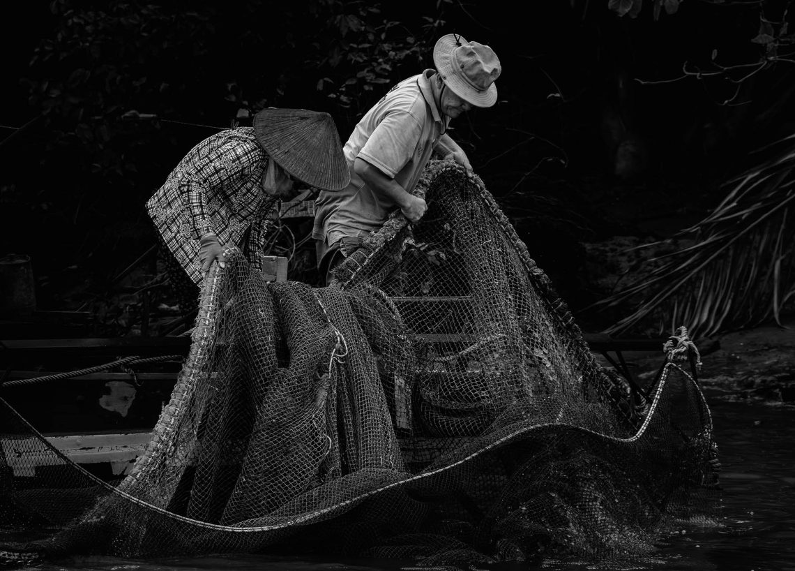 Pescadores do Delta do Mekong