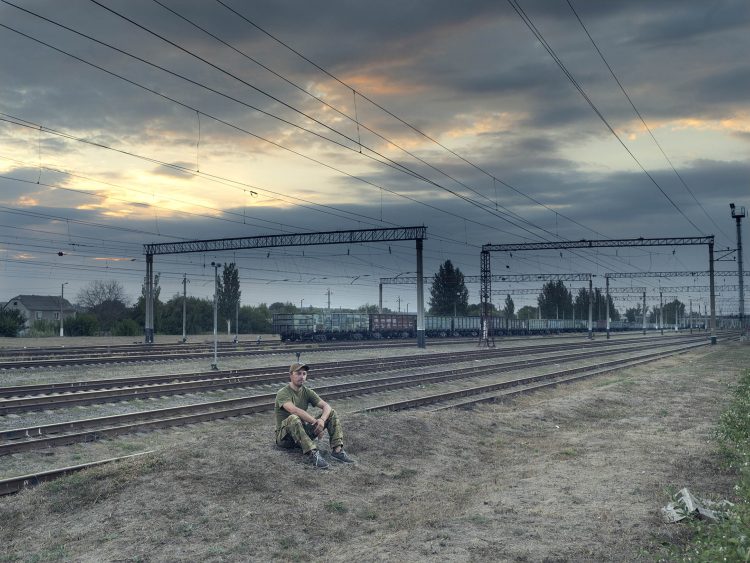 Azov Military. Donbas. August 2024
I met this soldier from the Azov Brigade on the side of the road in Donbas.
They were accompanying volunteers who are helping Ukrainians with their daily lives in Donbas. The Azov Brigade is one of the most prestigious in the Ukrainian army, and they are constantly on the front lines in the most perilous operations.
Accompanying volunteers therefore represents a "break" from this conflict for them.